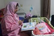 تدریس معلم دانش آموزان استثنایی دزفول از روی تخت بیمارستان